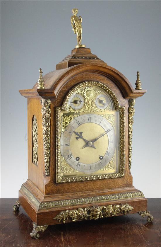 An early 20th century ormolu mounted oak bracket clock, 22.5in.